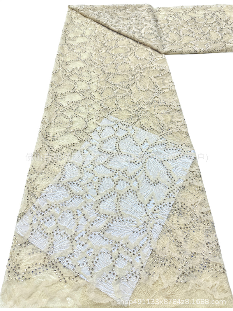 Nuevo hueco flor de encaje fondo tela de perforación caliente pesada cola de pez vestido de boda vestido de noche brindis tela spot