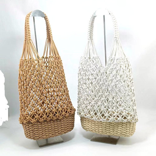 New hollow bucket hand-woven straw bag women's shoulder handbag ins style fishnet forest beach bag
