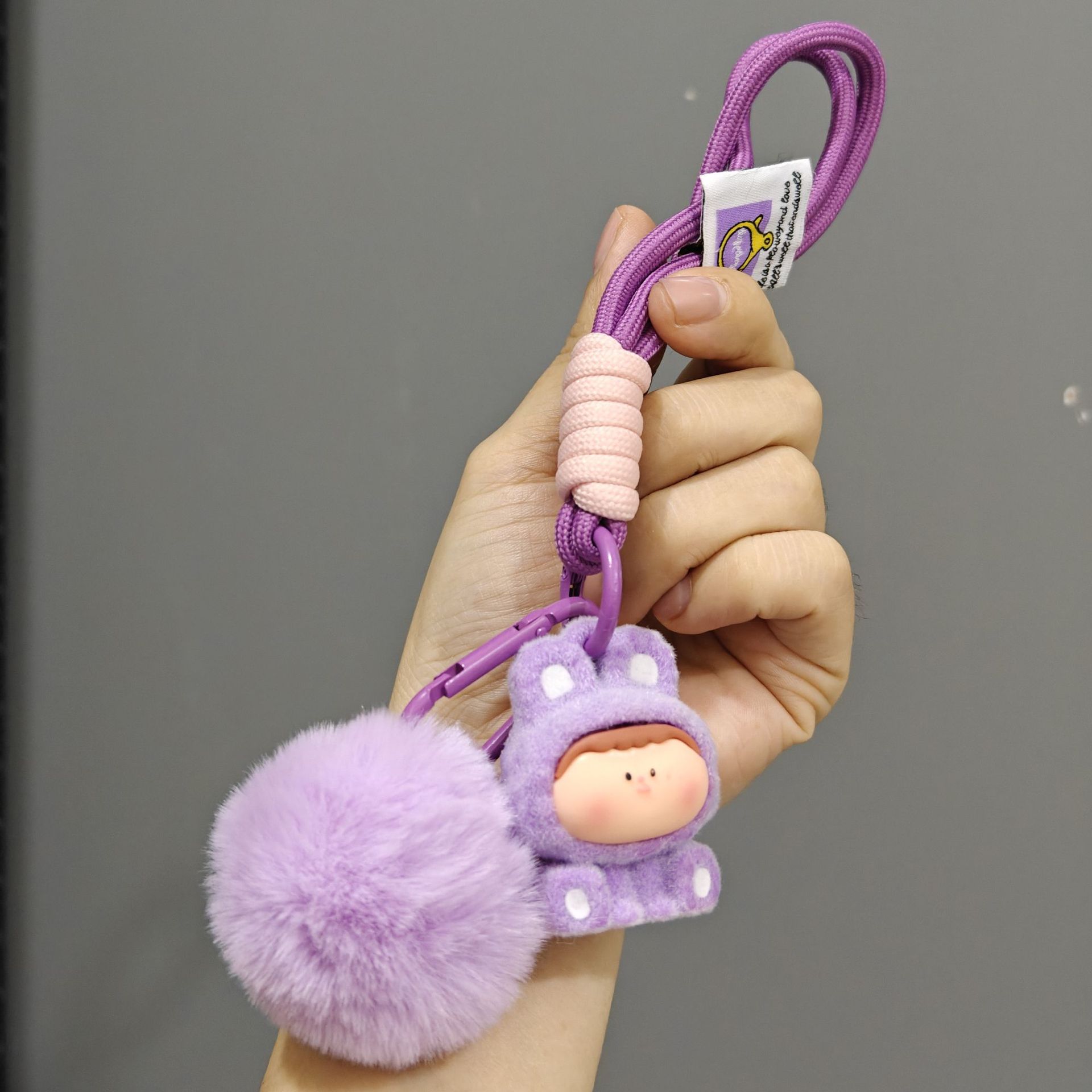 Caricatura floc amarelis llavero de automóvil pareja colgante bolsos creativos colgar garra máquina regalos al por mayor