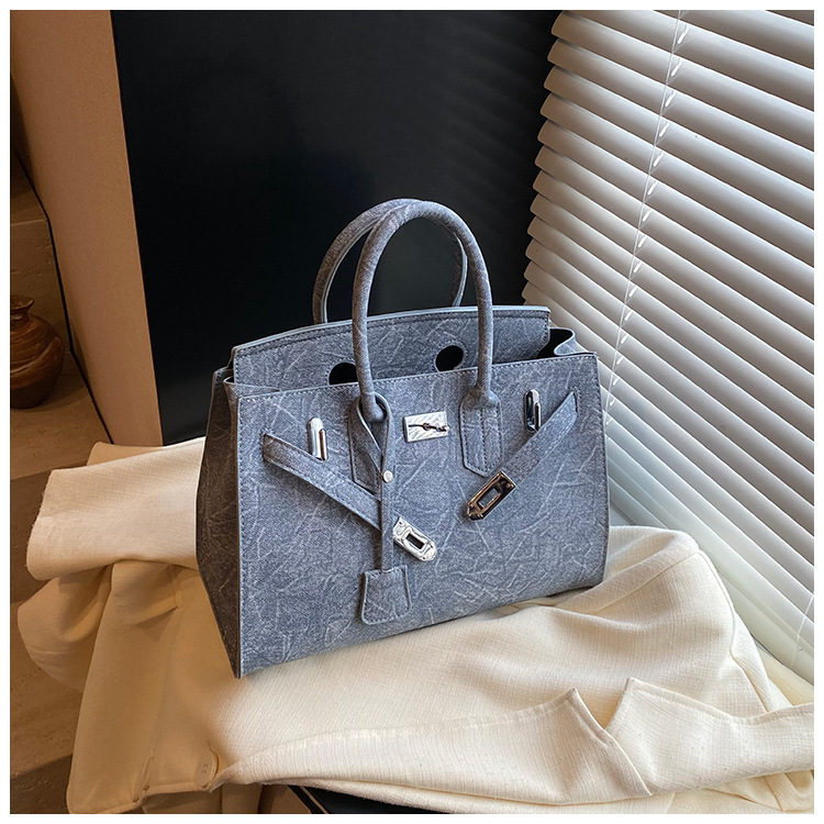 Bolso de platino simple retro ventas calientes de mujeres nuevas moda transfronterizas de alta calidad Kelly bolso de hombro de gran capacidad
