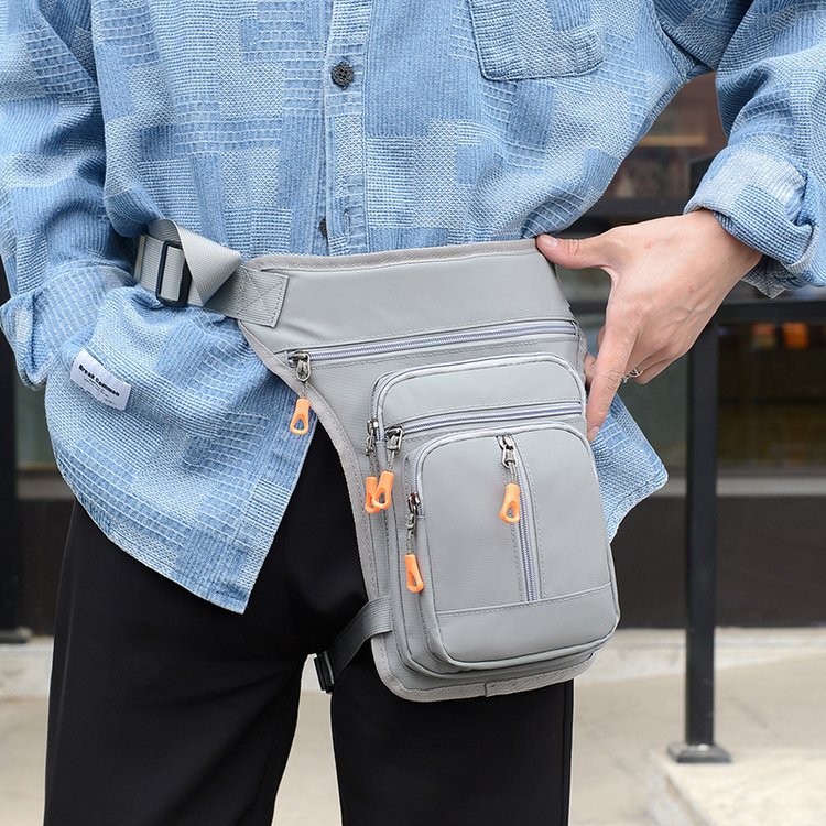 Bolso de cintura bolso de mensajero multifuncional para hombres nuevo bolso de pecho de nicho simple personalidad de la moda bolso de pierna fresco de moda fábrica al por mayor