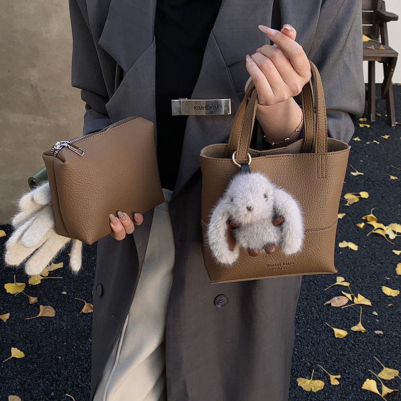 Bolso de cubo de mano coreano, bolso de hombro para mujeres extranjeras 2025, nuevo estilo de alta calidad, simple bolso de transporte