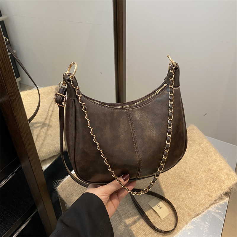 Bolsa de cadena de textura para mujeres de gran capacidad 2025, nuevo bolso de mujer simple PU, bolso de hombro de moda empalmado mochila