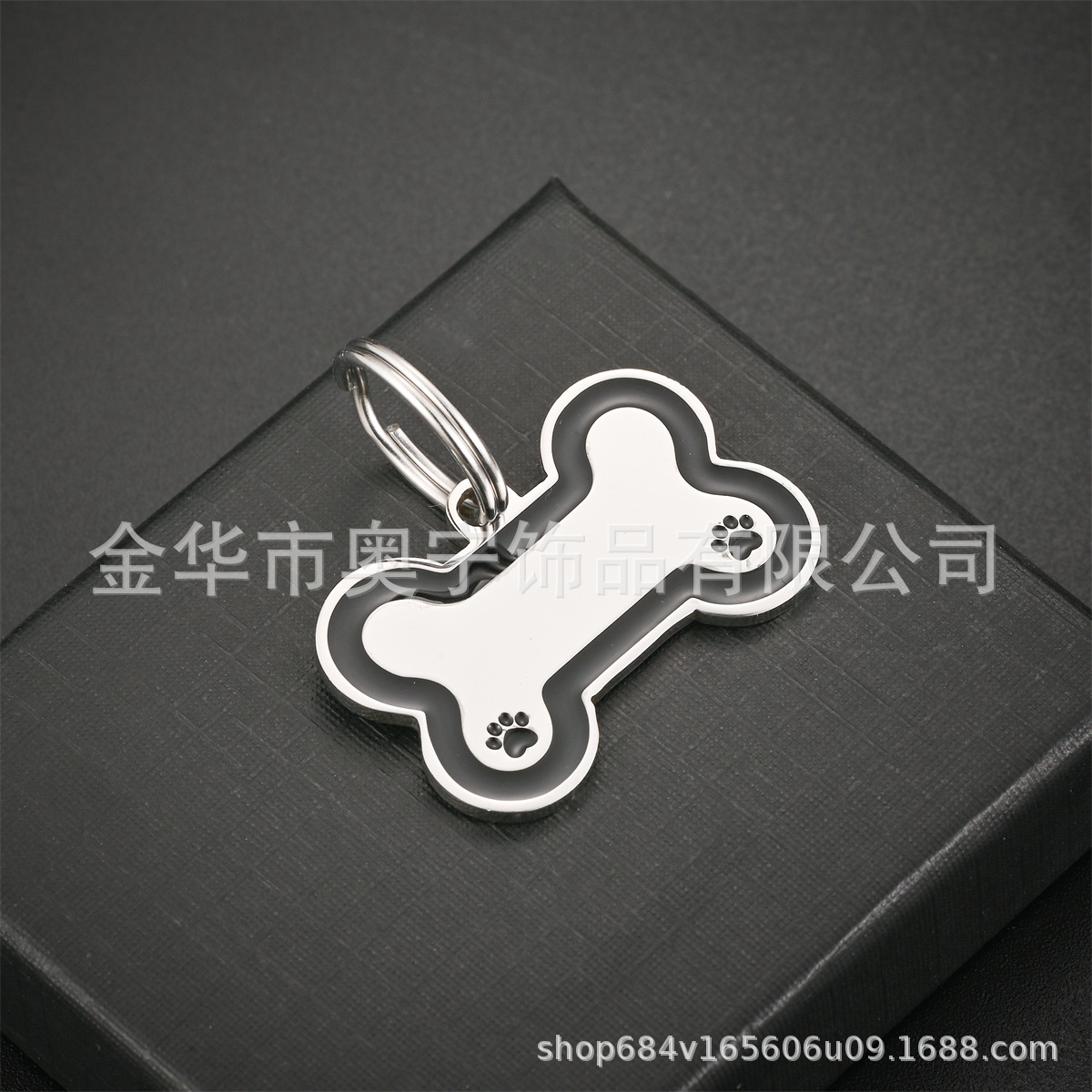 Spot al por mayor de acero inoxidable marca de perro de goteo nuevo hueso de perro marca de mascota fuente transfronteriza de acero de titanio marca anti-pérdida