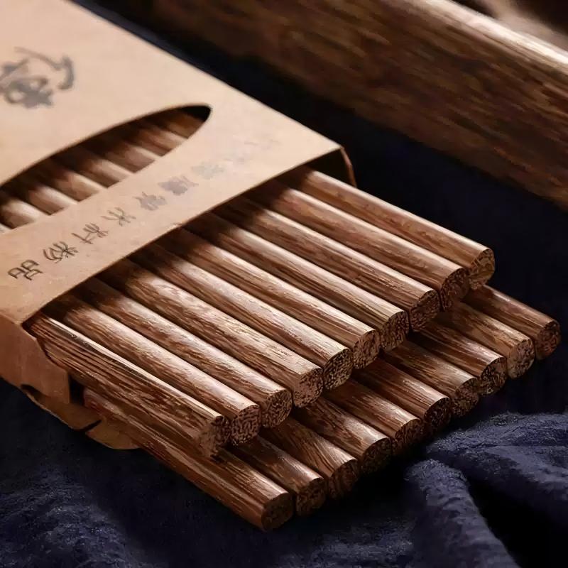Palillos de madera de ala de pollo 10 cajas dobles antideslizantes para el hogar Palillos de madera maciza 25CM Palillos de madera de sándalo rojo al por mayor personalizados