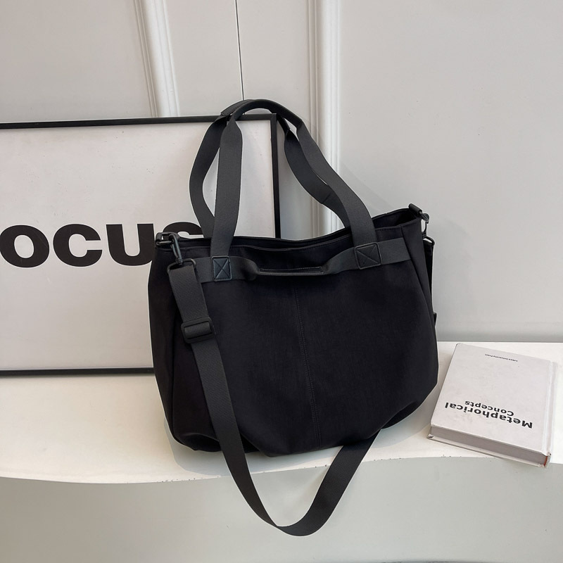 Bolsos de viaje transfronterizos de gran capacidad Bolsos de tela Oxford simples de moda femenina Bolsos tote de todo fósforo Bolsos de hombro de moda coreana