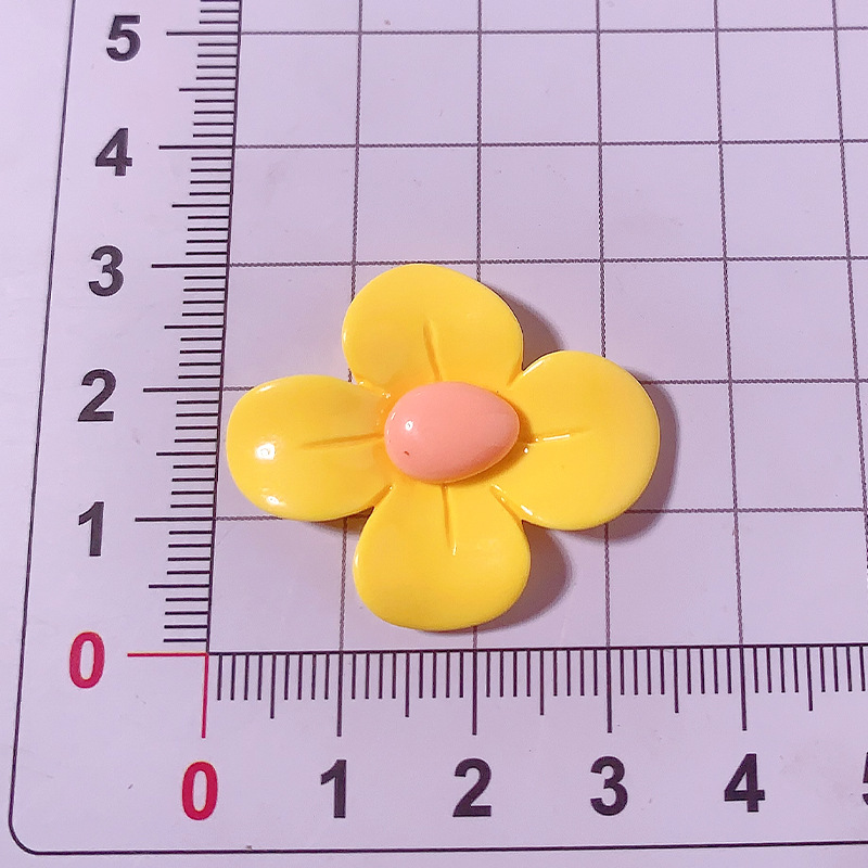 Accesorios de resina de cuatro pétalos de macarrón transfronterizo DiDi accesorios para el cabello de la caja del teléfono móvil agujero de los zapatos colgantes pequeños materiales hechos a mano