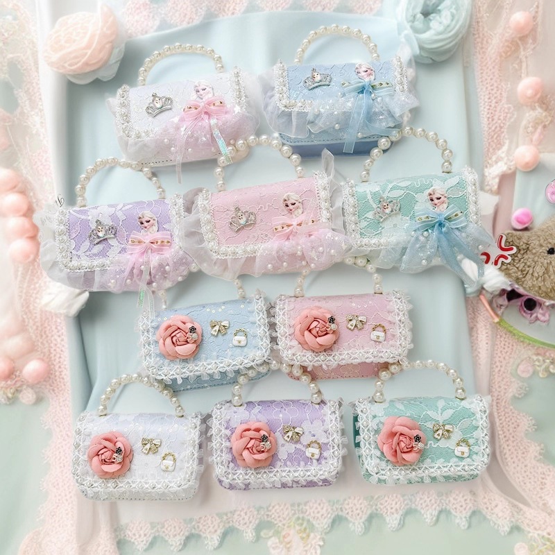 Nuevo bolso infantil, bolso de moda de perlas, bolso de hombro de flores de niñas, bolso de moda de cadena, mochila pequeña