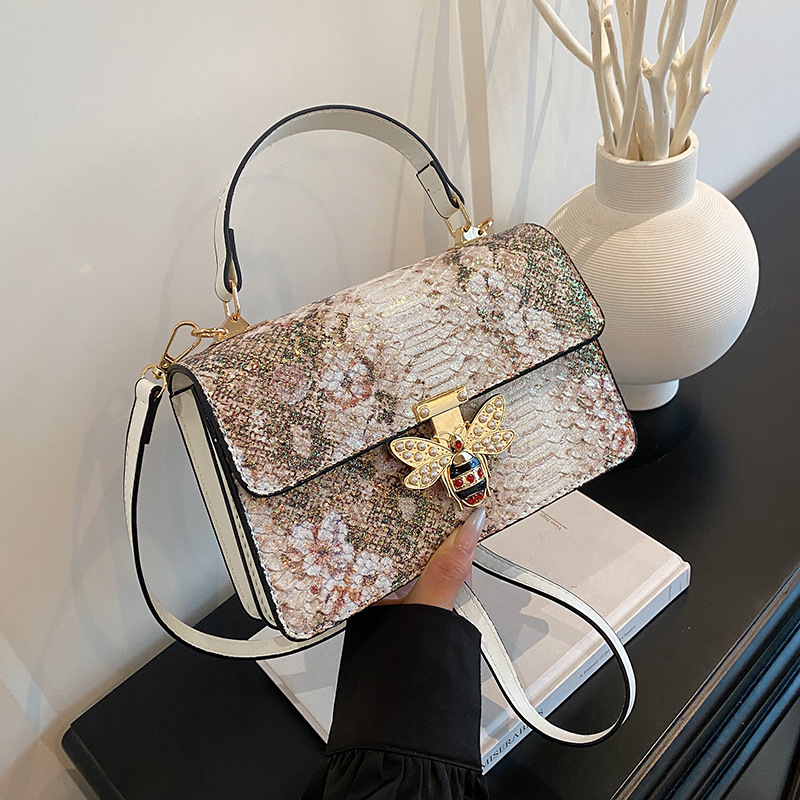 Bolso de alta calidad con textura 2025 verano nuevo estilo bolso femenino con lentejuelas bolso de hombro con estampado de piel de serpiente abeja flor bandolera