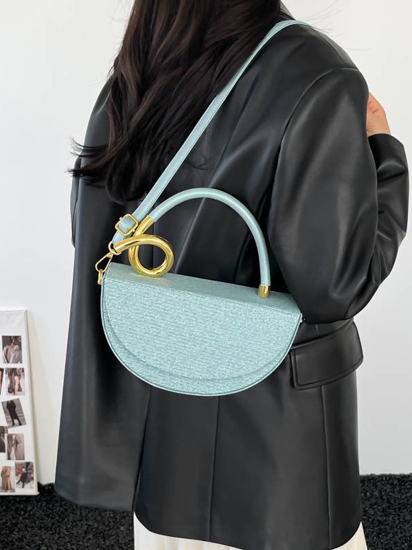 Nicho de diseño de bolso de silla de montar medio círculo, bolso de mano de textura de alta calidad, moda lujosa, bolso de hombro universal.