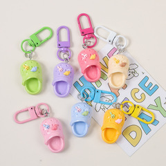 カラーの穴の靴のキーホルダーins少女の心の日本のペンダントのかわいいお嬢さんのアクセサリはdiyの部品を飾って卸売りします。