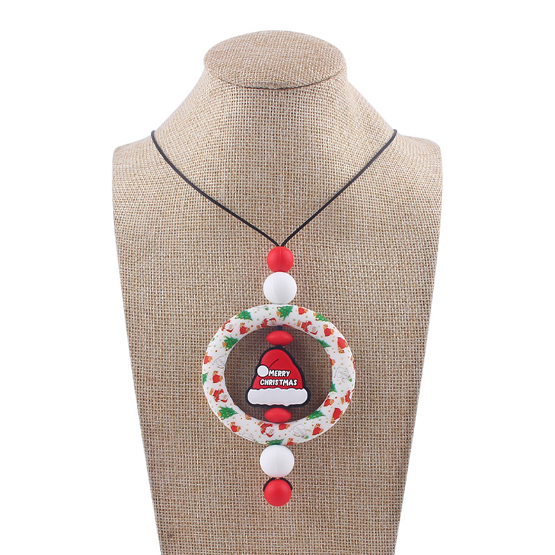 Bebé de dibujos animados de Navidad collar bebé creativo de silicona Santa Claus mordedura COLLAR COLGANTE hecho a mano