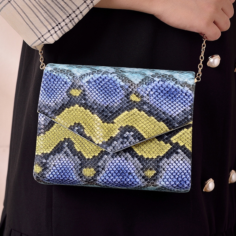 Creativa nicho de moda serpentina bolsa de estilo europeo y americano cadena patrón animal bolsa cruzada-frontera bolso de noche de las mujeres