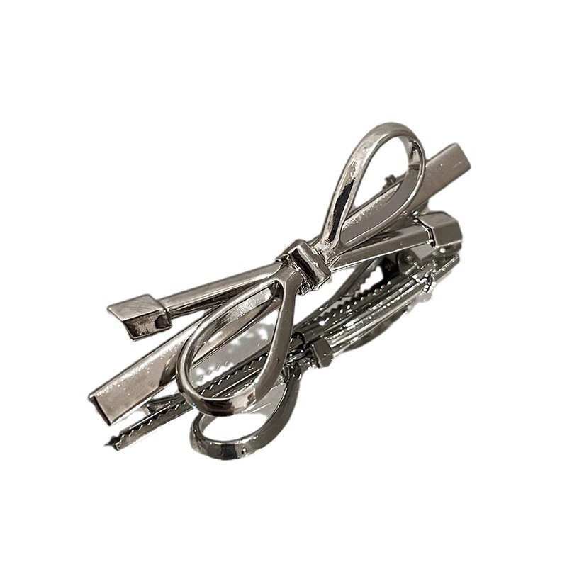Fermaglio per capelli a forma di fiocco argento per donna clip_voghion.com
