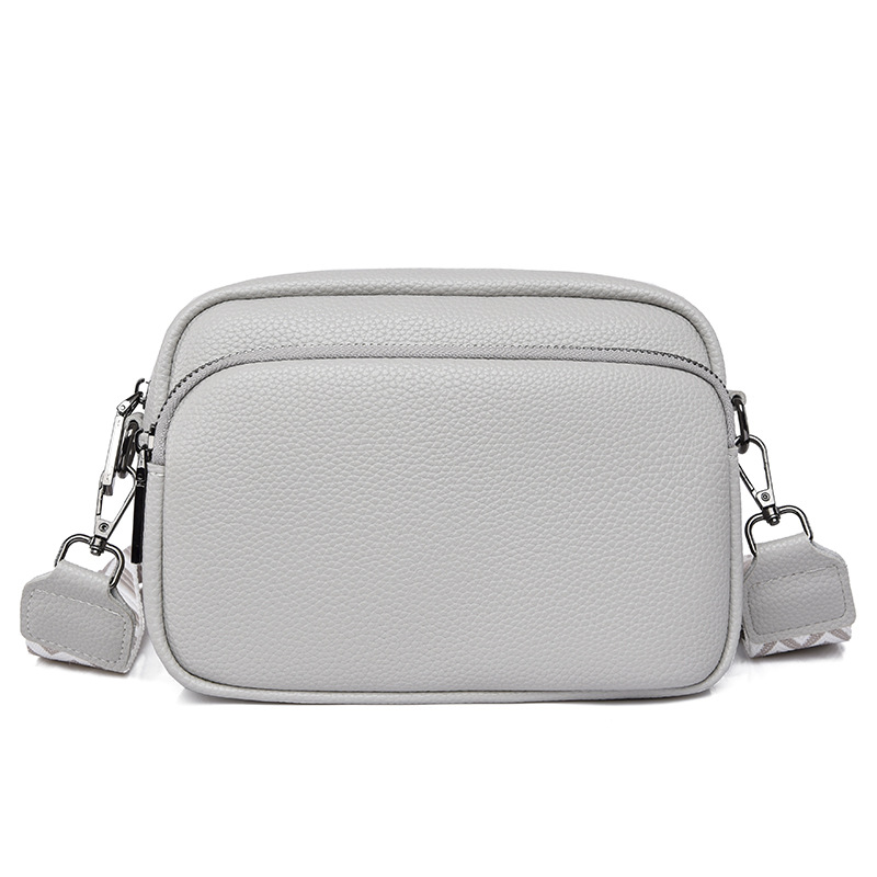 Bolso de mujer de cuero genuino transfronterizo de DENK 2023 nueva bolsa de mensajero de hombro de nicho de moda primera capa de piel de vaca pequeña bolsa cuadrada