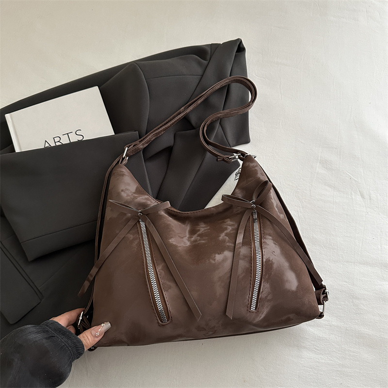 Bolsa de hombro retro suave pitot bolso arco 2025 nueva moda moda coreana bolsa de hombro de gran capacidad casual