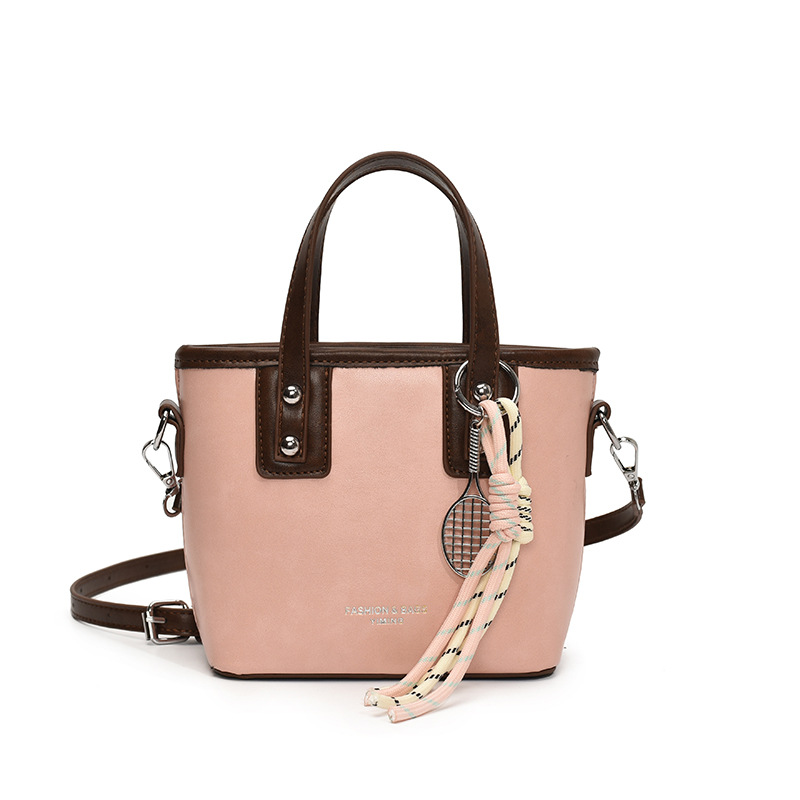 Bolso de mano de alta gama de nicho para mujer 2025 nuevo bolso de hombro de todo fósforo de color en contraste bolso de cubo de mensajero súper caliente de moda