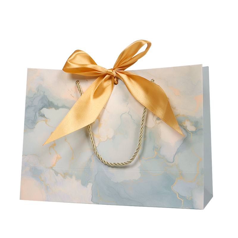 Bolso de papel arco bolsa de impresión ropa bolsa de regalo bolsa de compras bolsa de embalaje bolsa de cosméticos