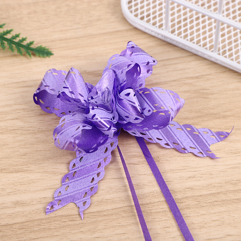 Comercio exterior Venta caliente 18 impreso encaje arco mano-Tirado flor Navidad vacaciones regalo embalaje tirar flor multicolor multi-patrón