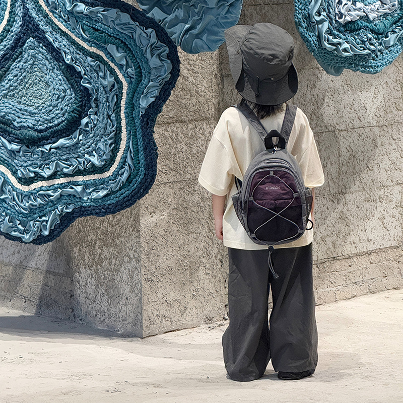 Mochila coreana para niños y niñas, estilo extranjero, bolsas escolares de color contrastante, nueva mochila multifuncional para niños.