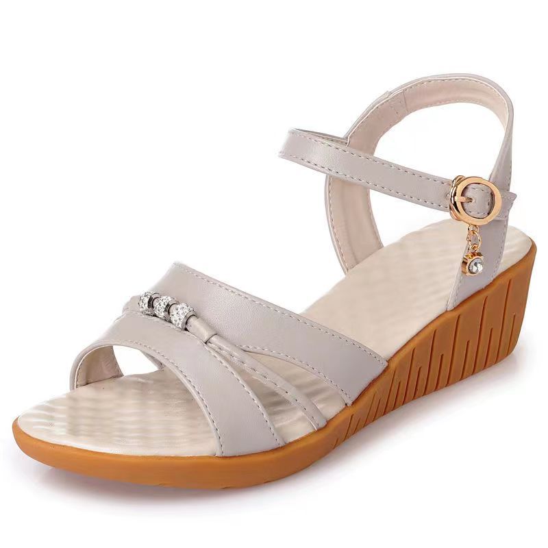 2026 verano nuevo estilo de moda universal tendón de toro tacones planos antideslizantes sandalias de tacones para mujeres elegantes sandalias de madre