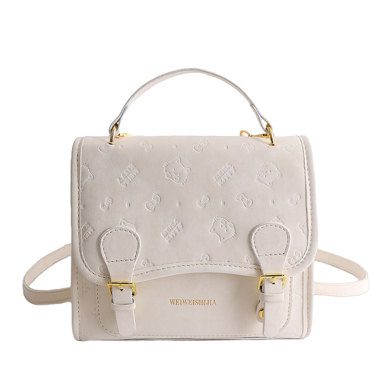 Mochila retro estilo universitario de doble hebilla 2026 nueva moda diaria sensación de bolso de viaje mochila en relieve