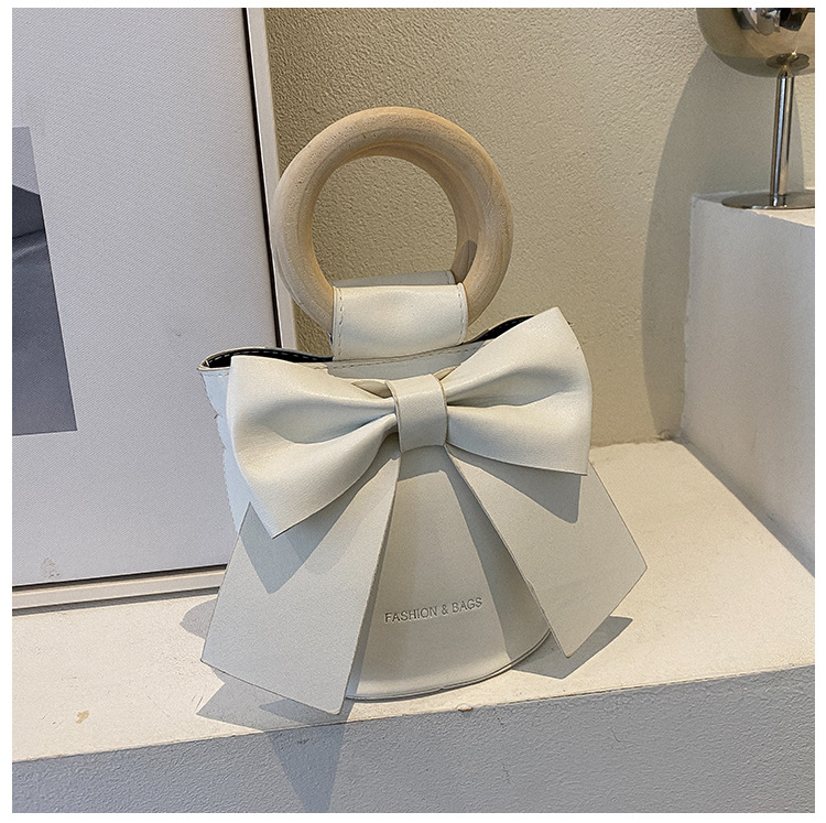 455g Weight Synthetic Leather Lining Material Sewing Thread Fashion Element Magnetic Buckle Closure Type Single Shoulder Strap, Double Handle Strap Type Bucket Bag Bags Type Casual Occasion Pu Leather Material Bow Knot Pattern All Seasons Season Women's Gender Elegant Style Bucket Shape Small Size Women's Small Pu Leather Bow Knot Elegant Sewing Thread Bucket Magnetic Buckle Bucket Bag 33