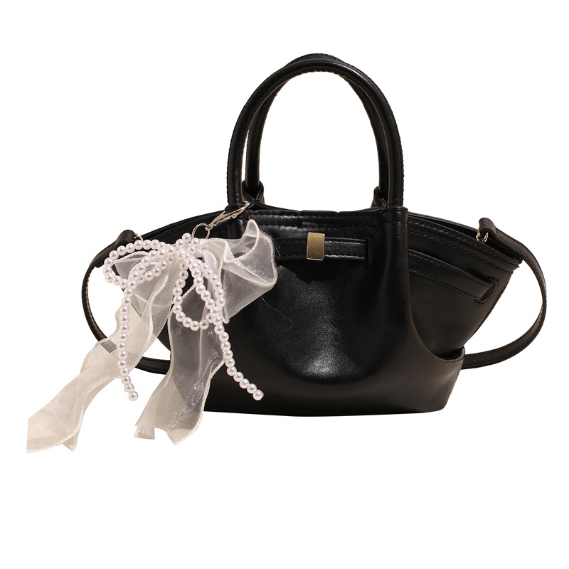 Nicho Zhong bolso de pulsera de brazalete para mujeres 2025, nuevo tipo de mochila de viaje, diseño de tendencia, bolso de cubo de alta calidad