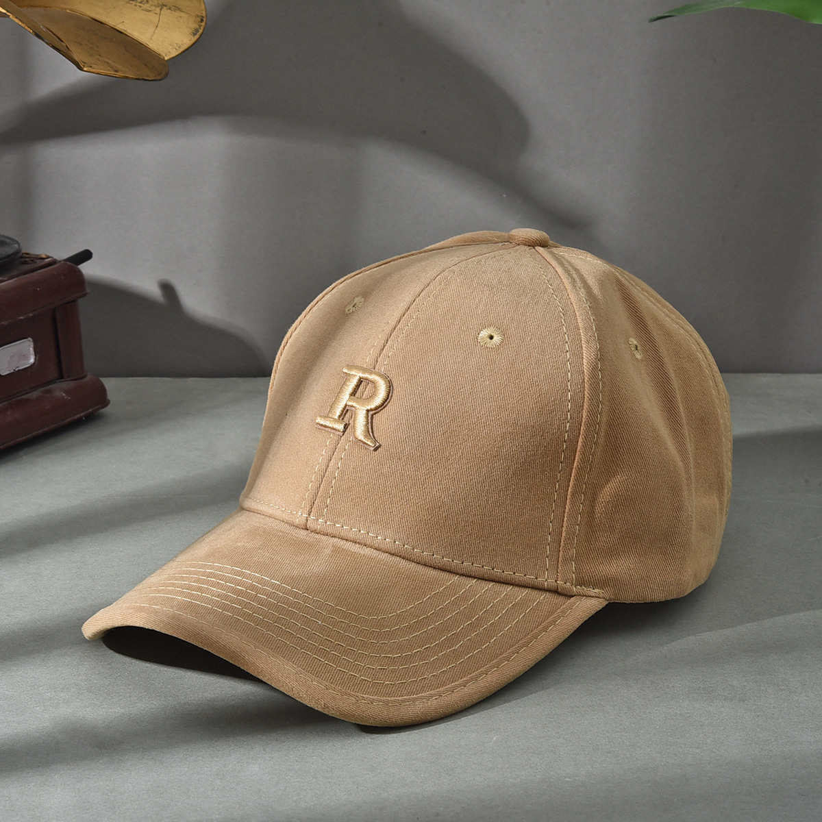 Versión de elevación R sombrero de estilo coreano sombrero de béisbol molido sombrero de béisbol de otoño y invierno sombrero de boca de pato cara pequeña