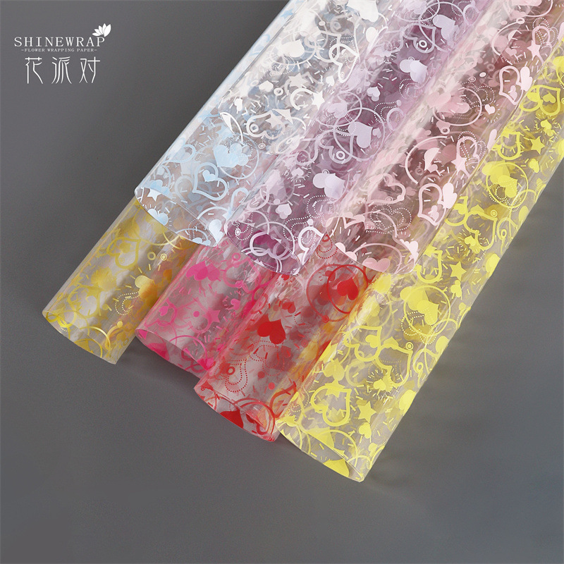 Fábrica de fiestas de flores al por mayor nuevo festival Qixi amor flor de papel de envoltura de flores transparente flores de papel de envoltura de flores regalos floristas
