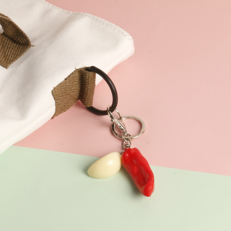 Simulación en stock llavero de ajo creativo anti-perdido llavero de coche estudiante mochila colgante Chili food and play fabricante