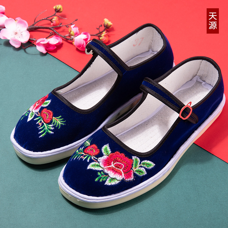 Fábrica directa vieja dama de Beijing hecha a mano zapatos de tela de tendón madre zapatos de estilo nacional botón zapatos de baile