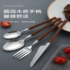 創意的な鶏の羽の木の柄のステンレスの食器の304ステンレスの刀のフォークのスプーンのセットの木製のステンレスの携帯の食器