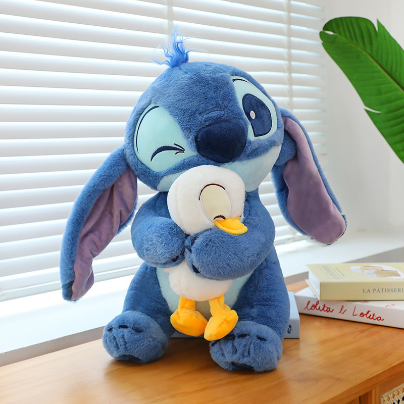 Stitch hugs donald duck