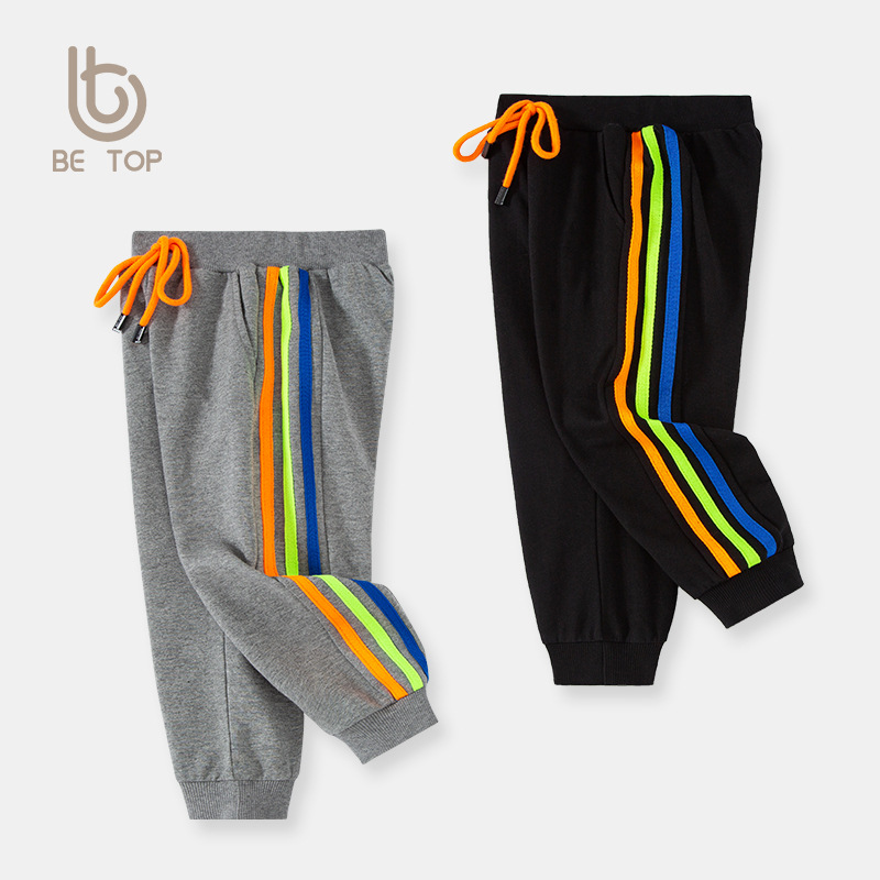 Pantalones deportivos para niños, estilo coreano, primavera y otoño 2026, pantalones de chándal para niños, pantalones largos de punto con tres rayas, venta al por mayor