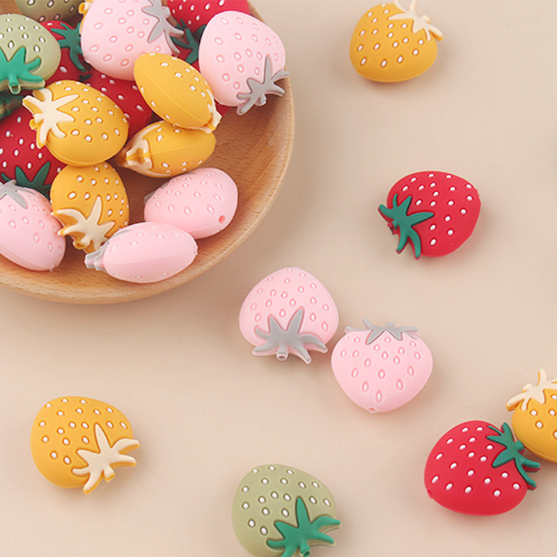 Nuevos productos para bebés, cuentas de silicona de fresa, chupete de bebé de bricolaje creativo, accesorios de pulsera de mordedor de dientes de cadena anti-caída