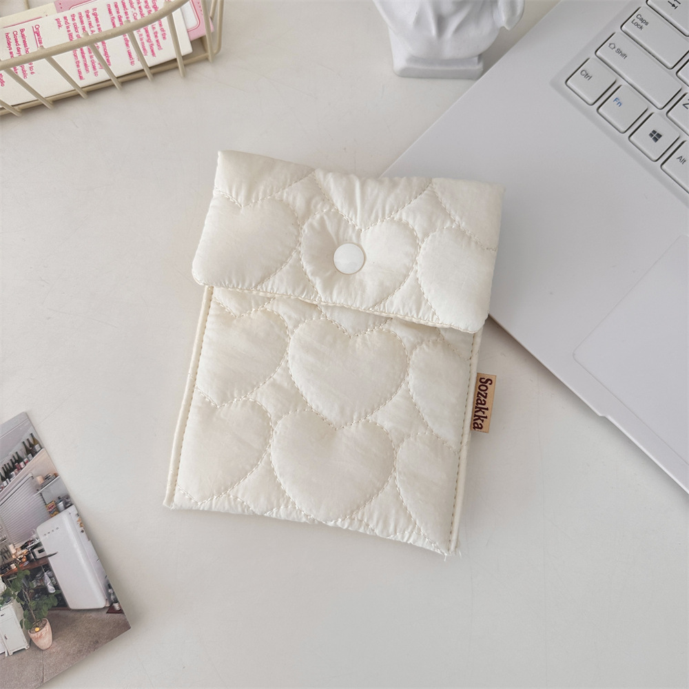 Heart-shaped milky white sanitary bag