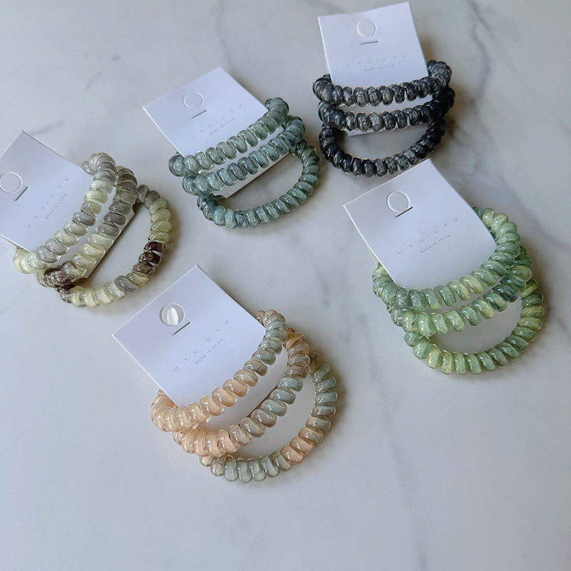 Set med 3 glansiga spiralhårsnoddar i gelélook_voghion.com