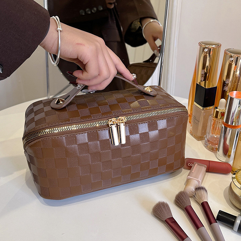 Koreansk version PU kudde makeup kvinnors bärbara kosmetiska resor stor kapacitet toalettartiklar väska, förvaringsväska_voghion.com