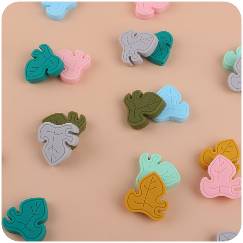 Bebé suministros de dibujos animados cuentas hoja de silicona DIY bebé mordedura chupete cadena mordedor pulsera accesorios de juguete