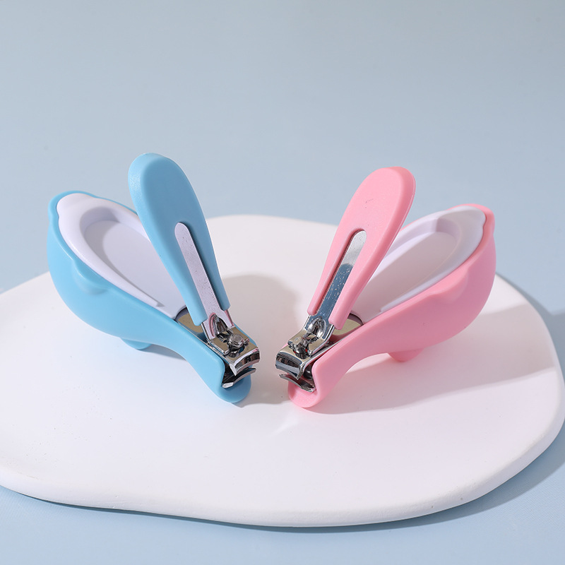 Tarjeta de succión inglesa cortaúñas para bebés dibujos animados lindo cortaúñas delfín recién nacido cortaúñas anti-pellizca para bebés