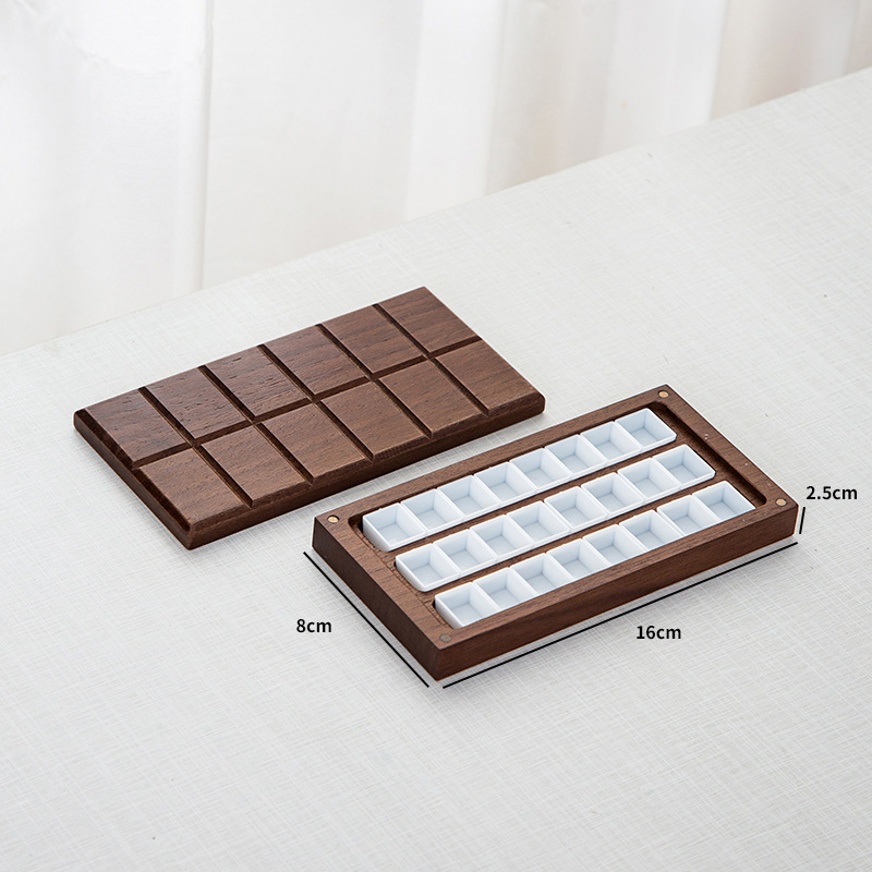 Chocolate de nogal 24 cuadrados con cinta blanca