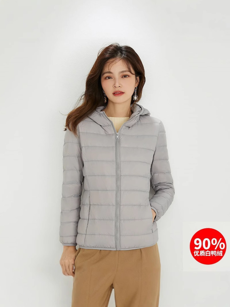 90 chaqueta de plumón de mujer con capuchón ligero corto de tamaño grande ligero estilo extranjero chaqueta de plumón blanco chaqueta Pinghu al por mayor