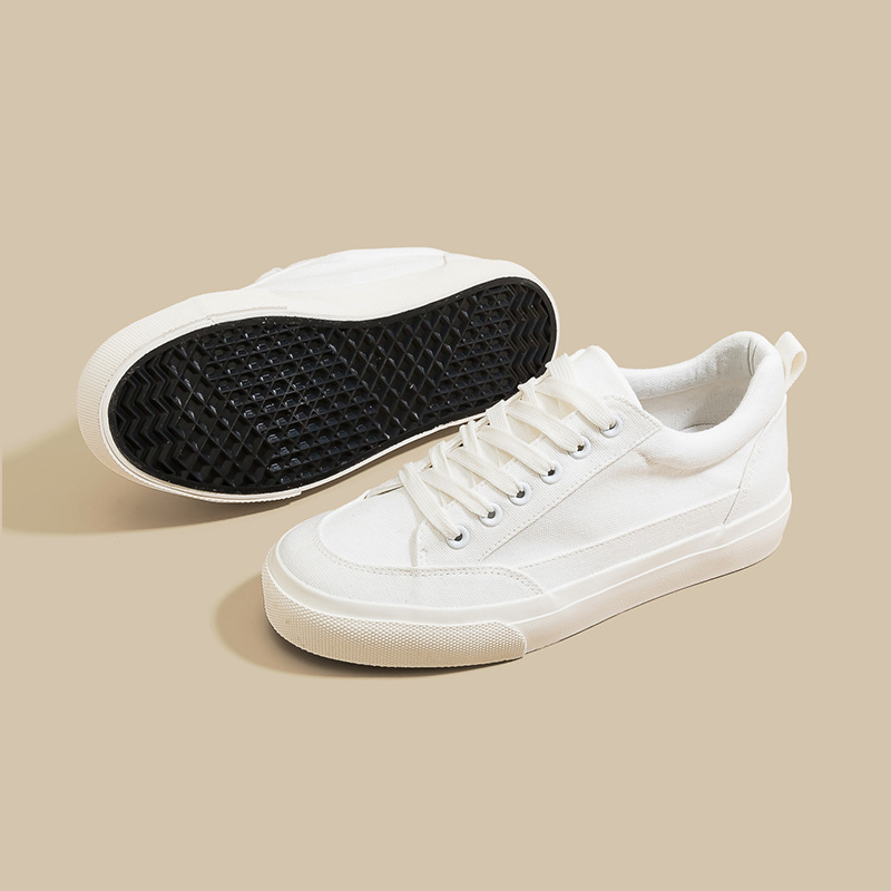 Zapatos blancos de pareja primavera nuevos zapatos casuales de mujer, zapatos de skate de altura baja zapatos de lona zapatos blancos al por mayor