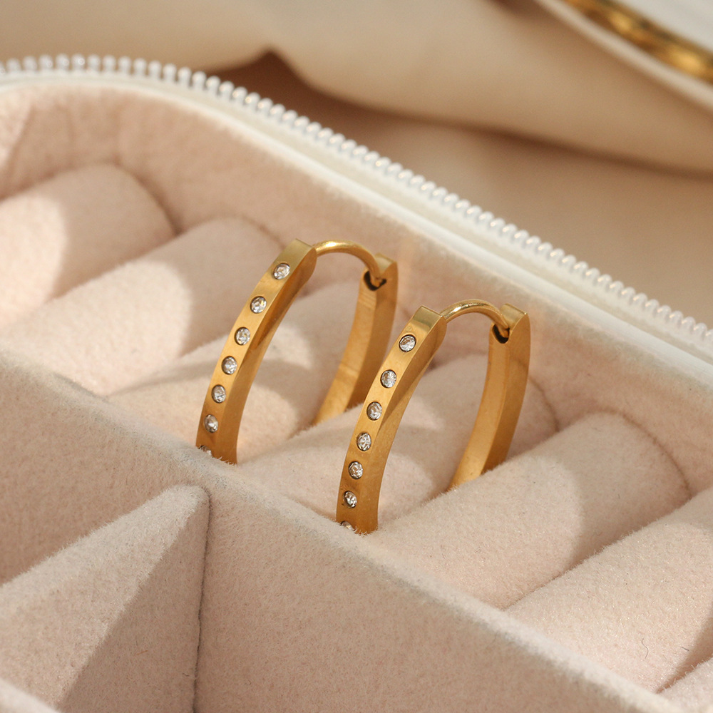 Title 2, Orecchini ovali da donna in acciaio inox con zi...