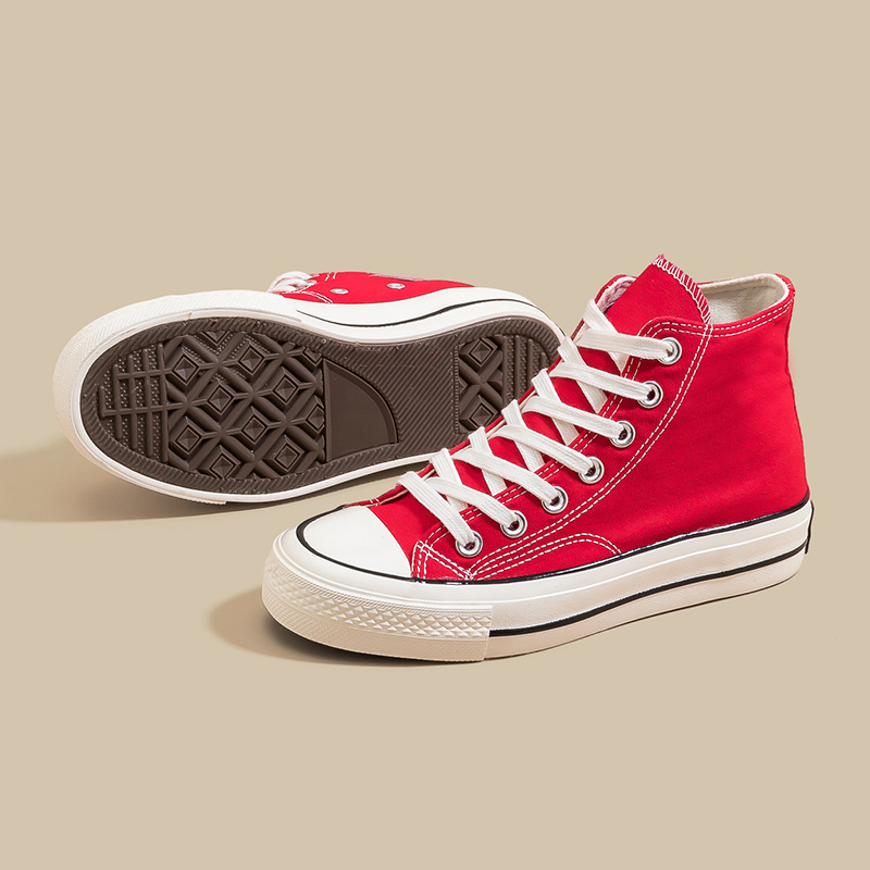 Año Nuevo 2026, zapatos de lona de alto nivel rojo para mujeres, zapatos casuales con suela de goma, moda de zapatos de alto nivel transpirables.