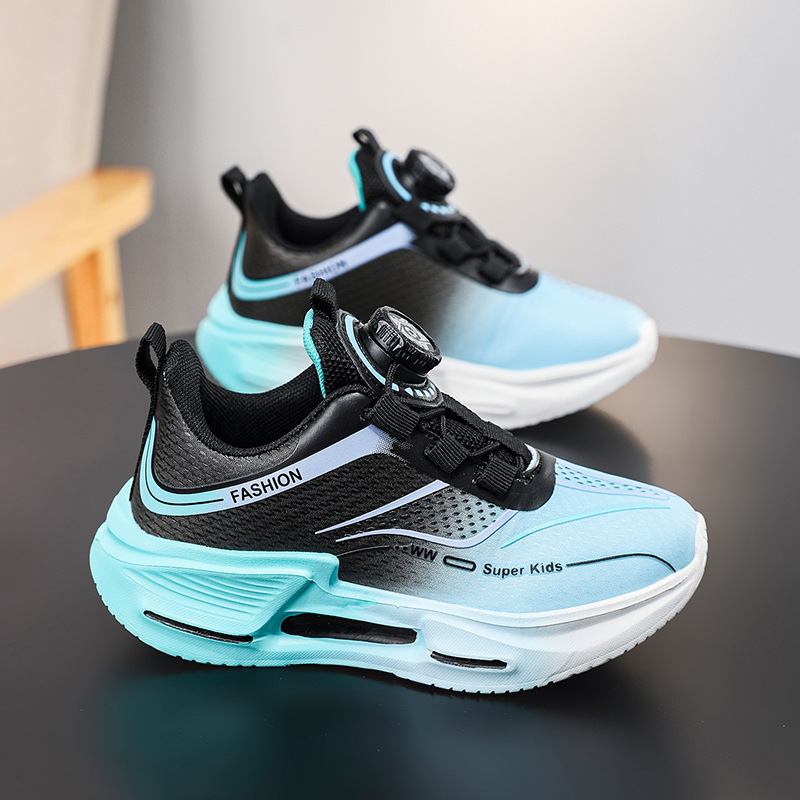 Fábrica directa de botón giratorio para niños zapatos de carrera primavera y otoño antideslizante para niños y niñas zapatos deportivos transpirables ligeros al aire libre cómodos