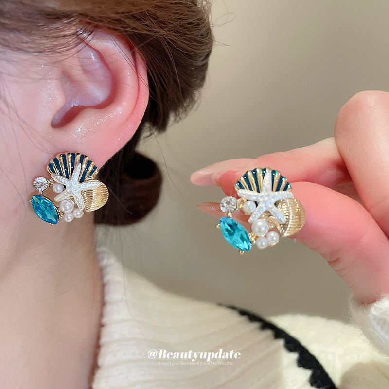 Collar de pendientes de coral de concha de estrella de mar goteando aceite, cadena de clavícula de todo fósforo de moda europea y americana, traje de nicho, lujo ligero, sentido de alta gama