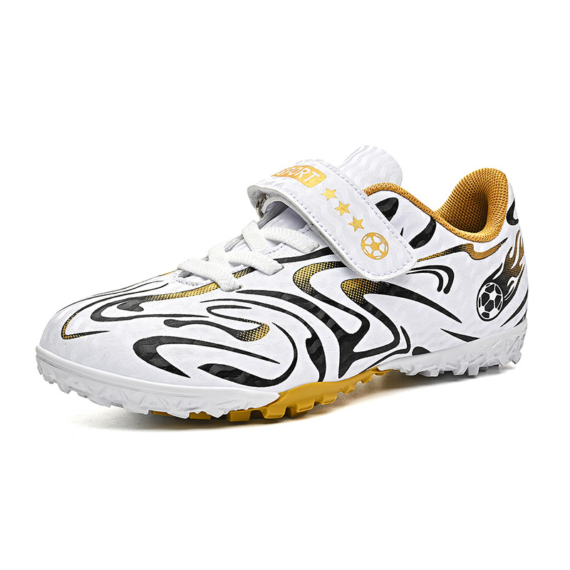 Niños y niñas transfronterizos cómodos transpirables deportes ociosos zapatos de fútbol de césped estudiantes niños antideslizantes fábrica directa