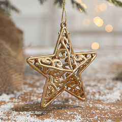 2025クリスマス装飾品クリスマスツリーペンダント立体透かし彫り金色プラスチック透かし彫りメッキ五角星